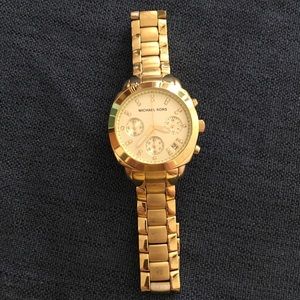 Gold tone MK watch